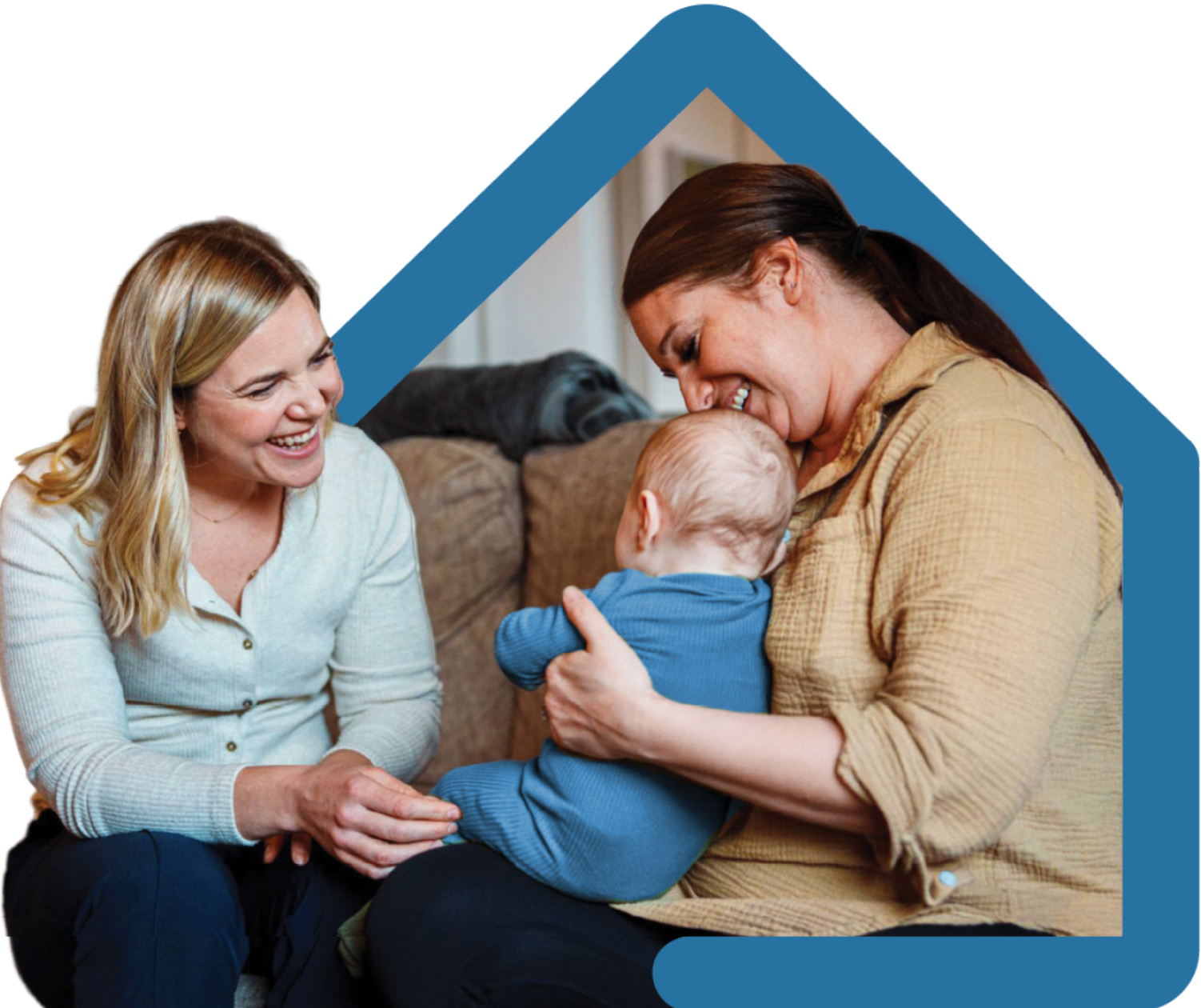 A home visitor and a mother holding her baby
